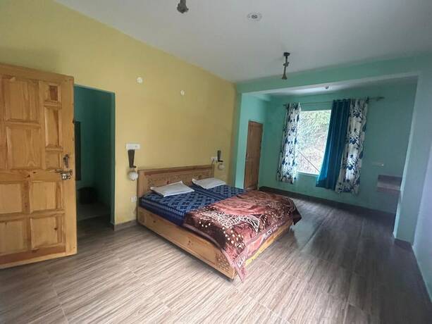 Imagen de la habitación del Hotel Footsteps Hostel And Cafe. Foto 17