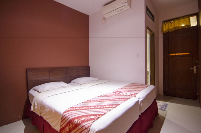 Imagen de la habitación del Hotel Fora Guest House Taman Lingkar. Foto 9