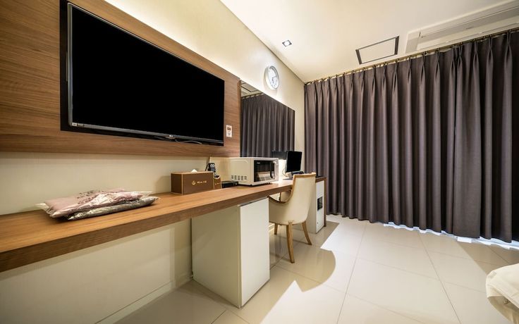 Imagen de la habitación del Hotel Forcheon Drive In Tiamo. Foto 8