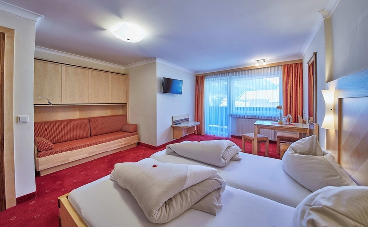 Imagen de la habitación del Hotel Forellenhof, Saalbach-Hinterglemm . Foto 7