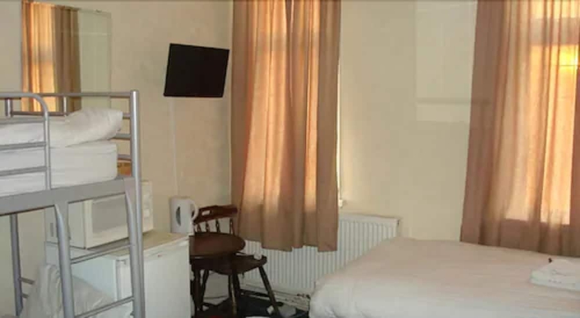 Imagen de la habitación del Hotel Forest Gate. Foto 13