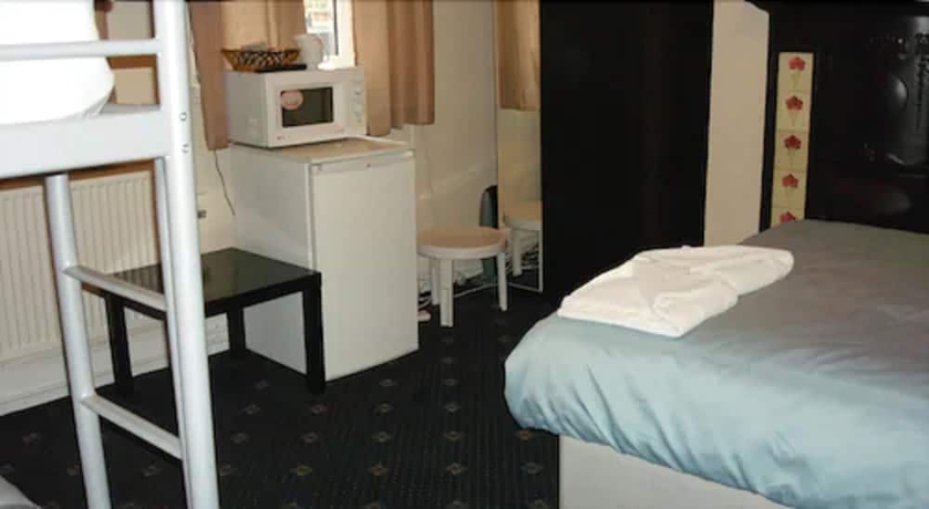 Imagen de la habitación del Hotel Forest Gate. Foto 14