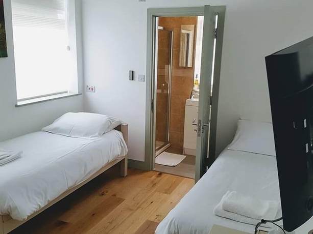 Imagen de la habitación del Hotel Forest House, Londres. Foto 4
