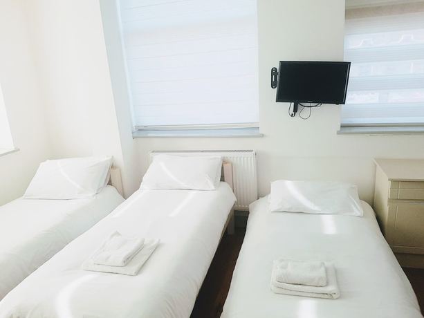Imagen de la habitación del Hotel Forest House, Londres. Foto 6