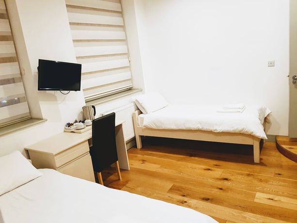 Imagen de la habitación del Hotel Forest House, Londres. Foto 17