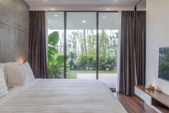 Imagen de la habitación del Hotel Forest In The Sky Flamingo Dai Lai Resort. Foto 16