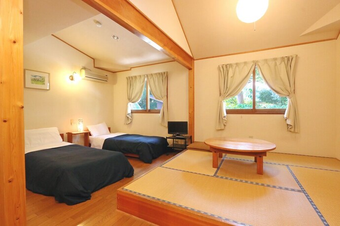 Imagen de la habitación del Hotel Forest Resort Cosmos. Foto 16