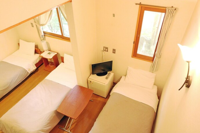 Imagen de la habitación del Hotel Forest Resort Cosmos. Foto 17
