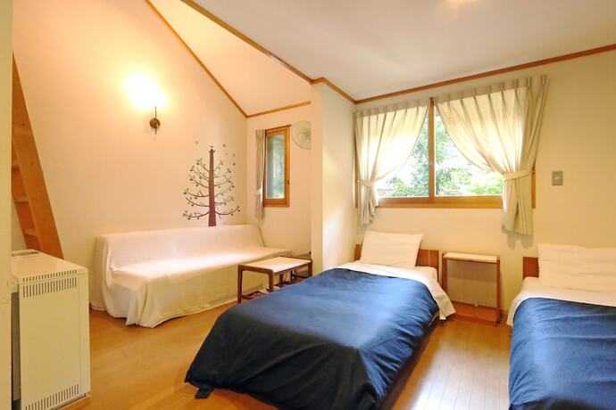 Imagen de la habitación del Hotel Forest Resort Cosmos. Foto 20