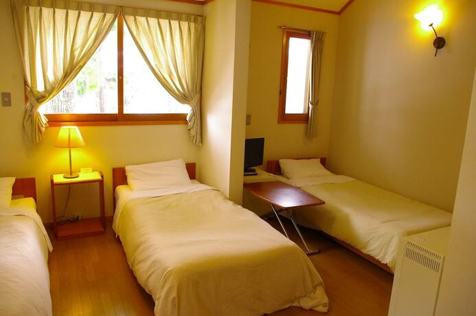 Imagen de la habitación del Hotel Forest Resort Cosmos. Foto 28