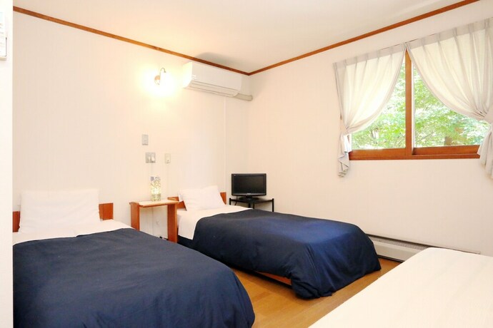 Imagen de la habitación del Hotel Forest Resort Cosmos. Foto 29