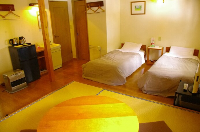 Imagen de la habitación del Hotel Forest Resort Cosmos. Foto 32