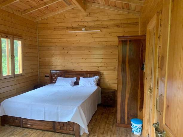 Imagen de la habitación del Hotel Forest View Farmhouse Stay. Foto 9