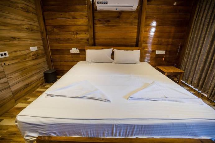 Imagen de la habitación del Hotel Forest View Farmhouse Stay. Foto 11