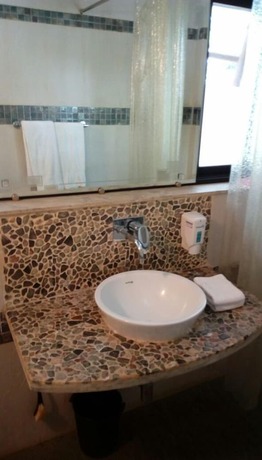 Imagen general del Hotel Forest Village Holiday Homes. Foto 3