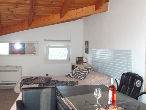 Imagen de la habitación del Hotel Forestata Village. Foto 8