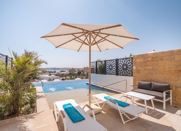 Imagen de la habitación del Hotel Fort Arabesque Resort, Spa and Villas. Foto 6