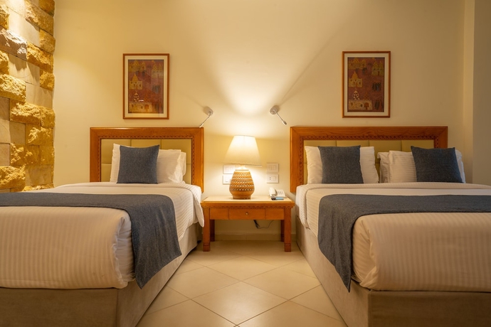 Imagen de la habitación del Hotel Fort Arabesque Resort, Spa and Villas. Foto 12