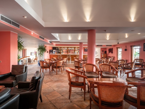 Imagen del bar/restaurante del Hotel Fort Arabesque Resort, Spa and Villas. Foto 3