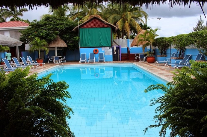 Imagen de la piscina del Hotel Fort George Hotel and Spa Belize. Foto 12