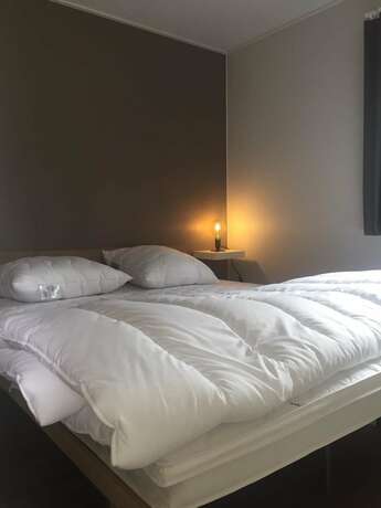 Imagen de la habitación del Hotel Fortduinen Campsite. Foto 11