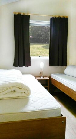 Imagen de la habitación del Hotel Fortduinen Campsite. Foto 17