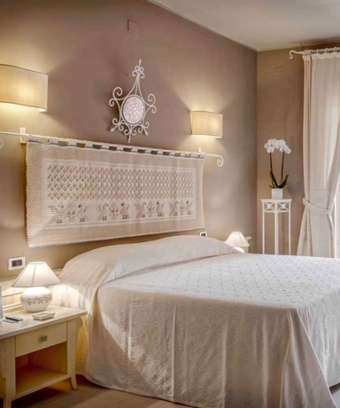 Imagen de la habitación del Hotel Forte Village Resort - Il Castello. Foto 3