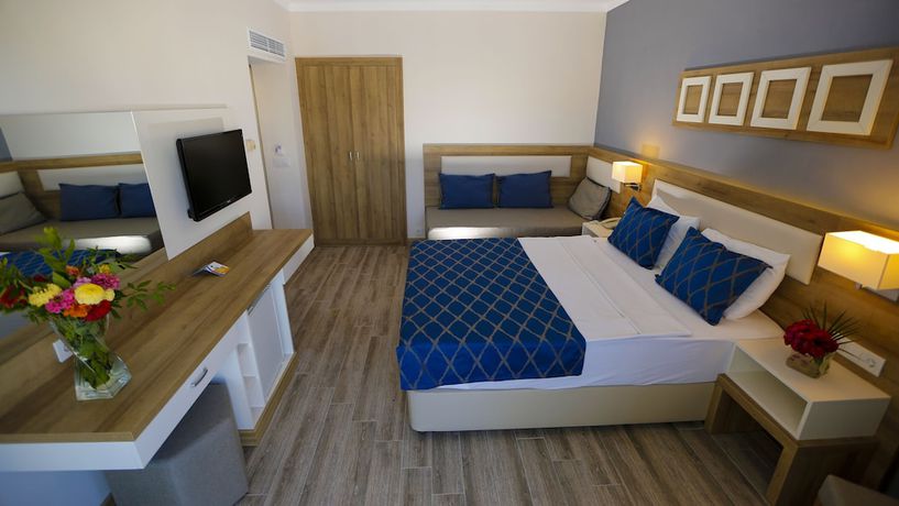 Imagen de la habitación del Hotel Fortezza Beach Resort. Foto 11