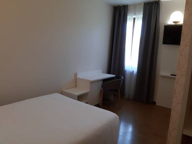 Imagen de la habitación del Hotel Fortuna BandB. Foto 17