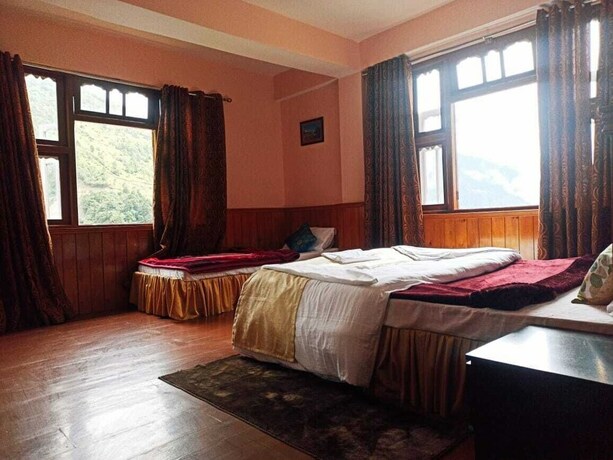 Imagen de la habitación del Hotel Fortuna Lachung. Foto 10