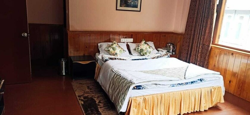 Imagen de la habitación del Hotel Fortuna Lachung. Foto 11