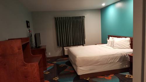 Imagen de la habitación del Hotel Fortuna Redwood Inn. Foto 3