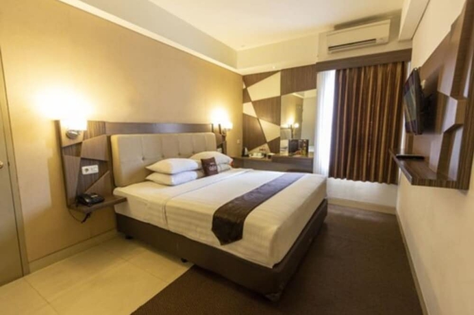 Imagen de la habitación del Hotel FortunaGrande Malioboro. Foto 2