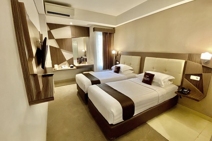 Imagen de la habitación del Hotel FortunaGrande Malioboro. Foto 3