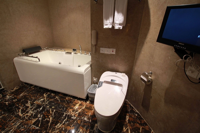 Imagen de la habitación del Hotel Fortune, Guangzhou. Foto 5