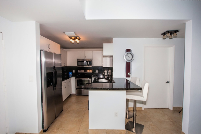 Imagen de la habitación del Hotel Fortune House Suites. Foto 3