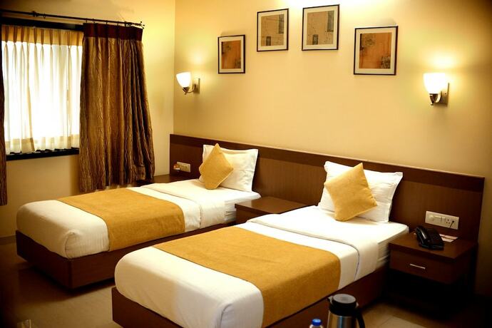 Imagen de la habitación del Hotel Fortune Palace, Jamnagar. Foto 17