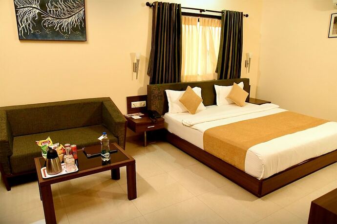 Imagen de la habitación del Hotel Fortune Palace, Jamnagar. Foto 18