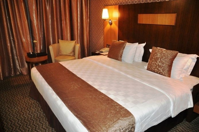 Imagen de la habitación del Hotel Fortune Plaza. Foto 8