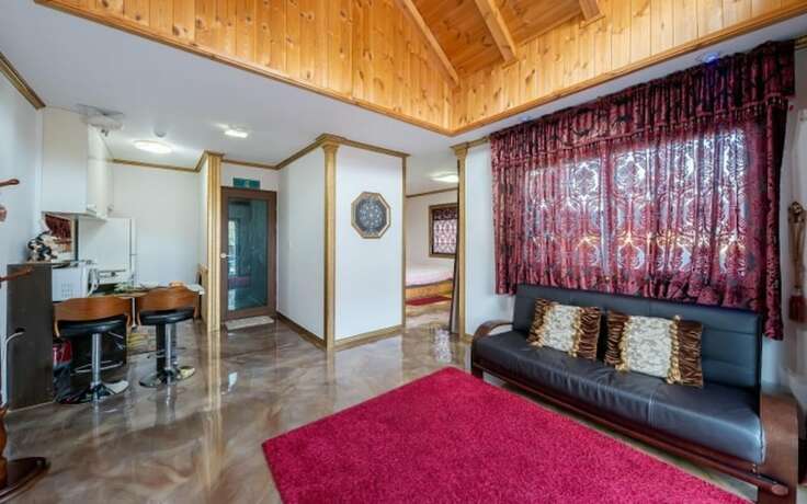 Imagen general del Hotel Fortune Rising Sun Hill Pension. Foto 4