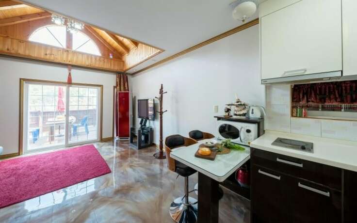 Imagen general del Hotel Fortune Rising Sun Hill Pension. Foto 7