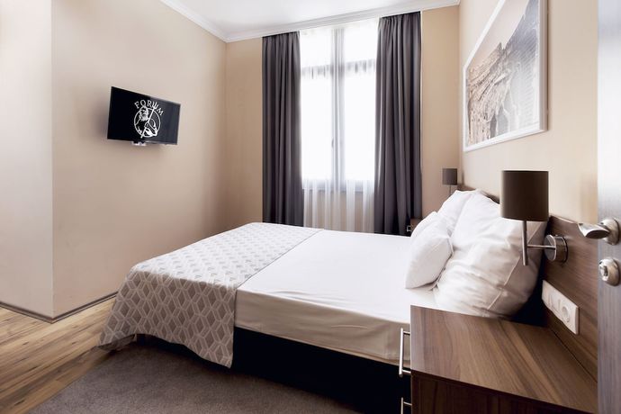 Imagen de la habitación del Hotel Forum Hotel. Foto 13