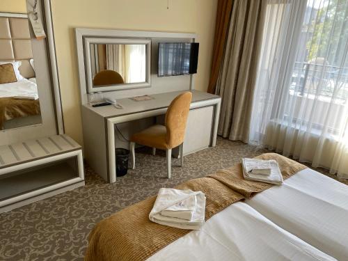 Imagen de la habitación del Hotel Forum, Pazardzhik. Foto 18