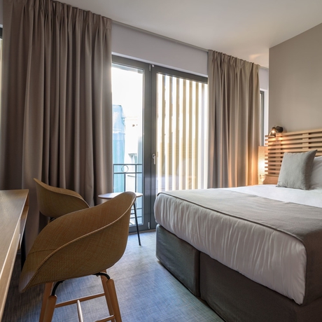 Imagen de la habitación del Hotel Fos DownTown Suites. Foto 4