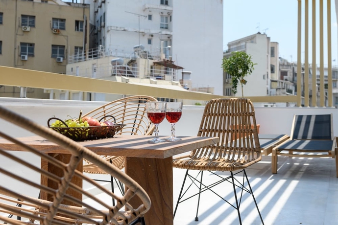 Imagen de la habitación del Hotel Fos DownTown Suites. Foto 13