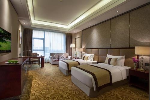 Imagen de la habitación del Hotel Foshan Classical Plaza. Foto 7