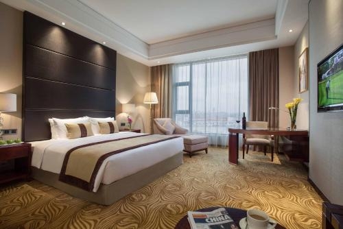 Imagen de la habitación del Hotel Foshan Classical Plaza. Foto 8