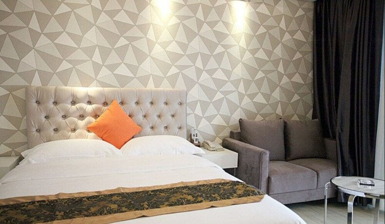Imagen de la habitación del Hotel Foshan Dream Apartment. Foto 6
