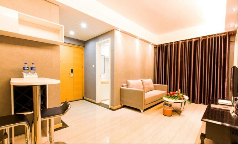 Imagen de la habitación del Hotel Foshan Dream Apartment. Foto 8