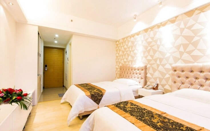 Imagen de la habitación del Hotel Foshan Dream Apartment. Foto 11